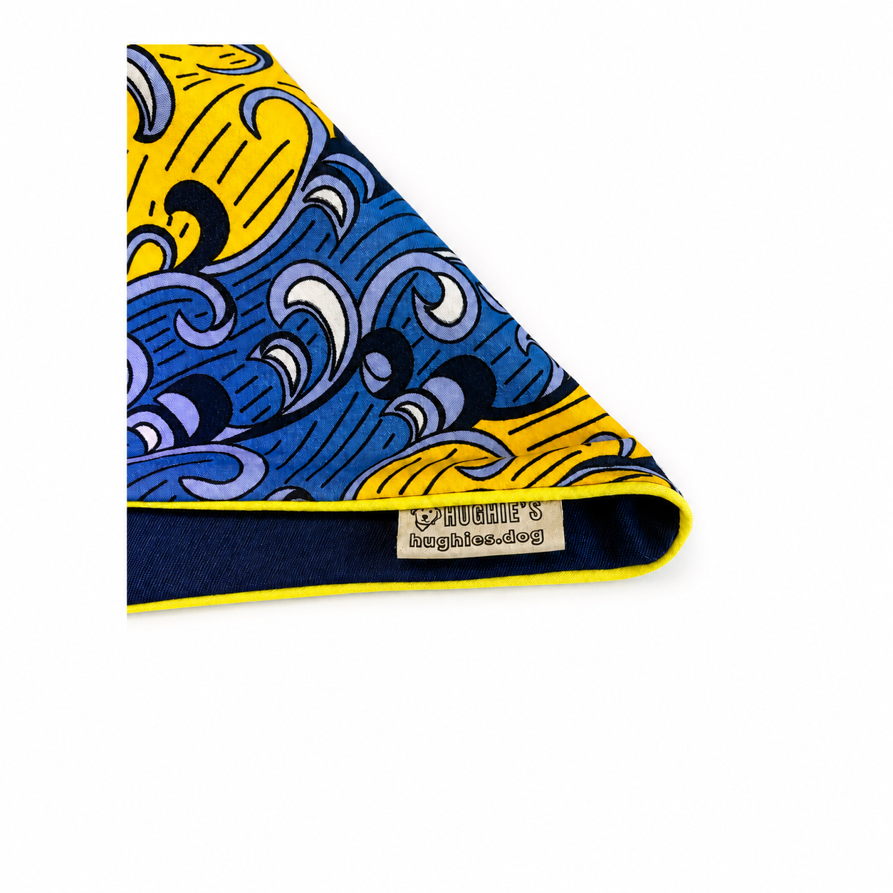 Close-up of yellow and blue Ankara cotton dog bandana with navy reverse and yellow piping