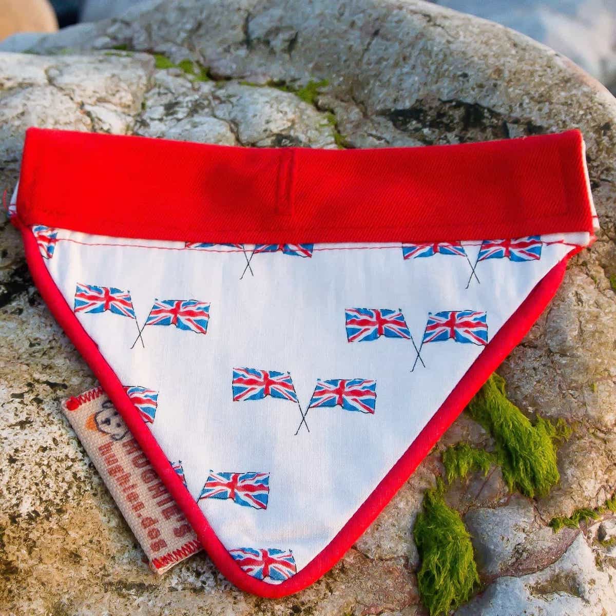 A luxury dog bandana with British flags on it.
