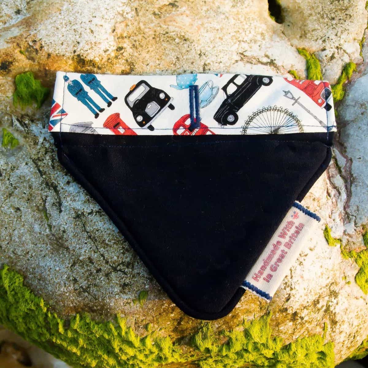 A luxury midnight bandana dog bandana with a design on it.