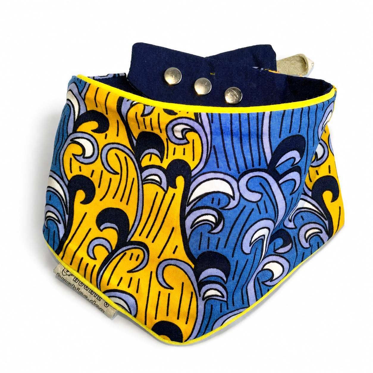Handmade Ankara print snap-on dog bandana in yellow and blue cotton with yellow piping