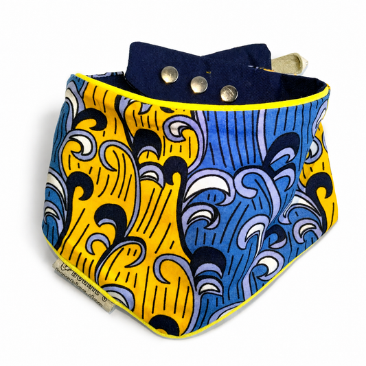 Handmade Ankara print snap-on dog bandana in yellow and blue cotton with yellow piping