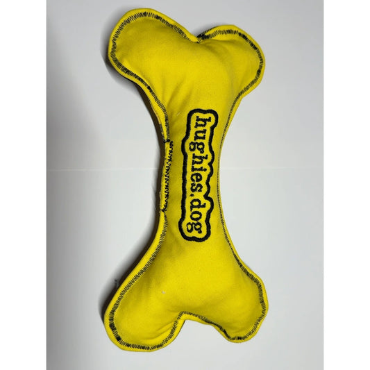 Yellow reverse of autumn check soft dog bone toy with embroidered Hughies dog logo