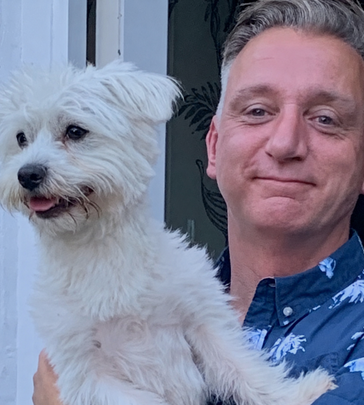 Nigel, founder of Hughies Dog Accessories, with Hugo