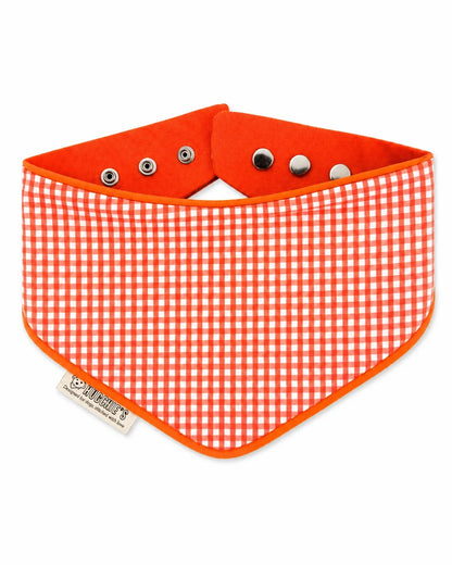 Orange gingham reversible snap-on dog bandana front view on white background