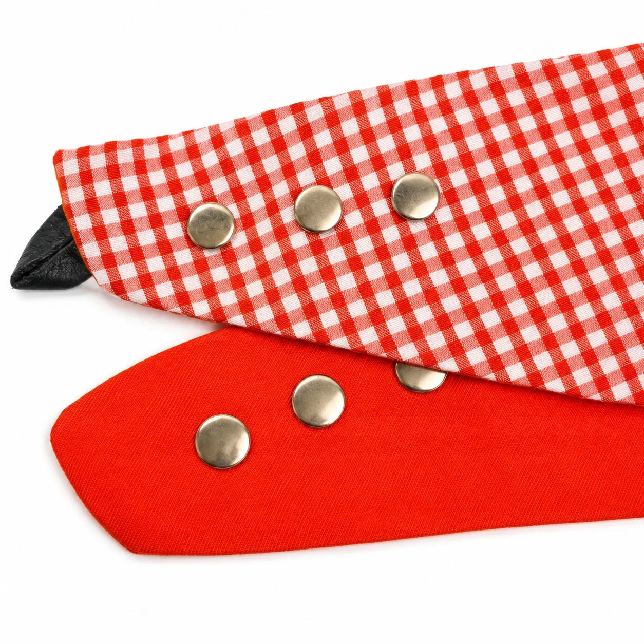 Orange gingham snap-on dog bandana metal popper fastening detail on white background