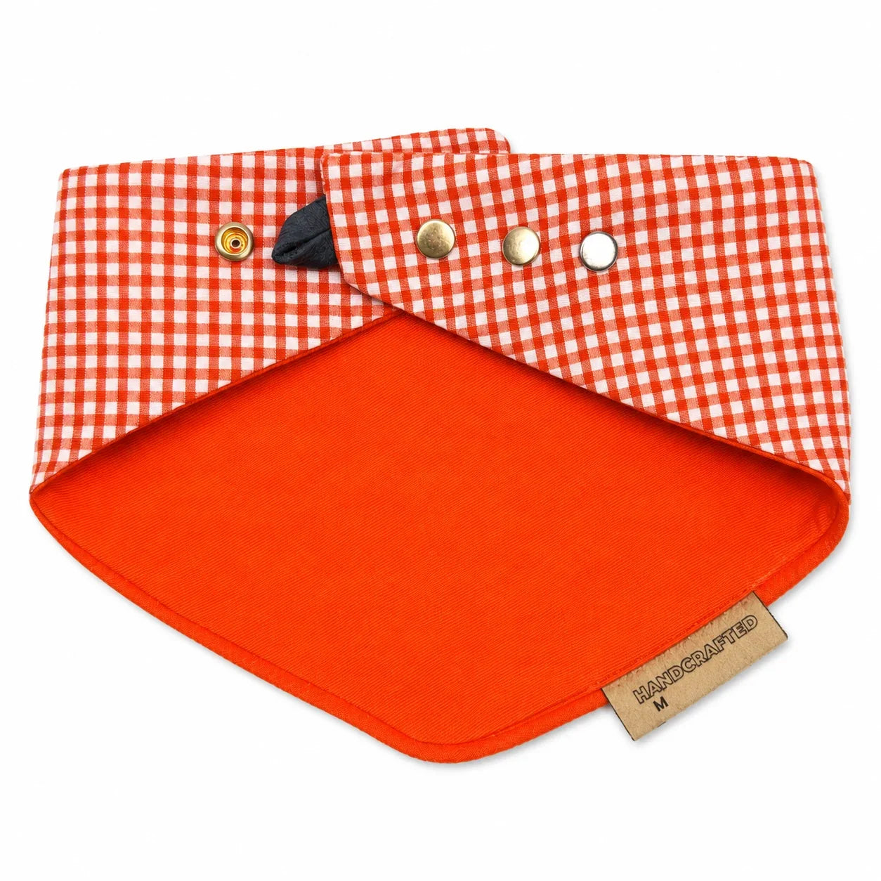 Orange gingham reversible snap-on dog bandana reverse side on white background