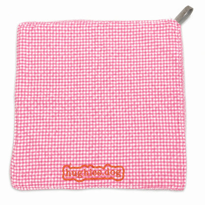 Pink gingham reusable dog drool cloth with embroidered Hughies logo