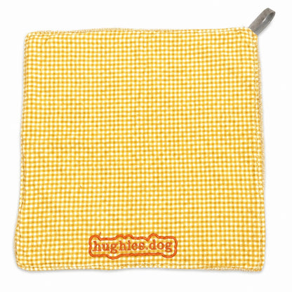 Yellow gingham reusable dog drool cloth with embroidered Hughies logo
